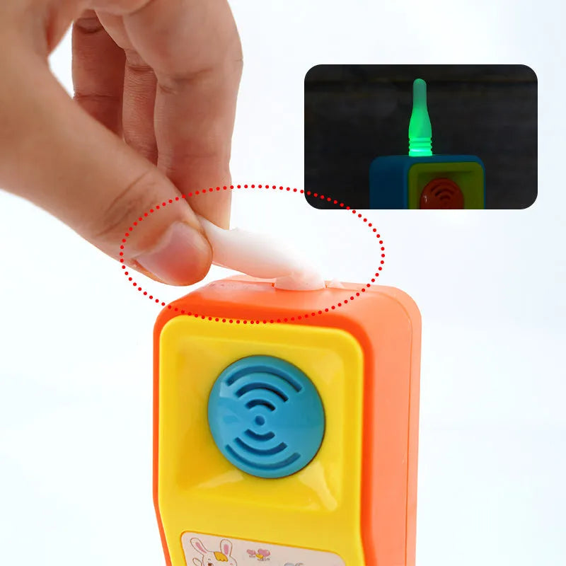 Children's educational toy with sound and light functions featuring cartoon animal design