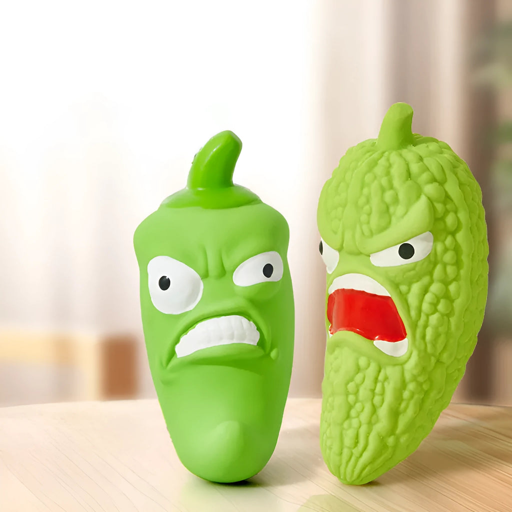 Vegetable-shaped dog chew toy in bitter melon and chili pepper designs with textured surfaces for dental cleaning