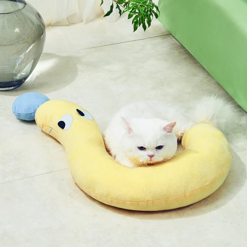 Blue rectangular cat and dog pillow cushion on a floor, dimensions 62 cm by 39 cm.