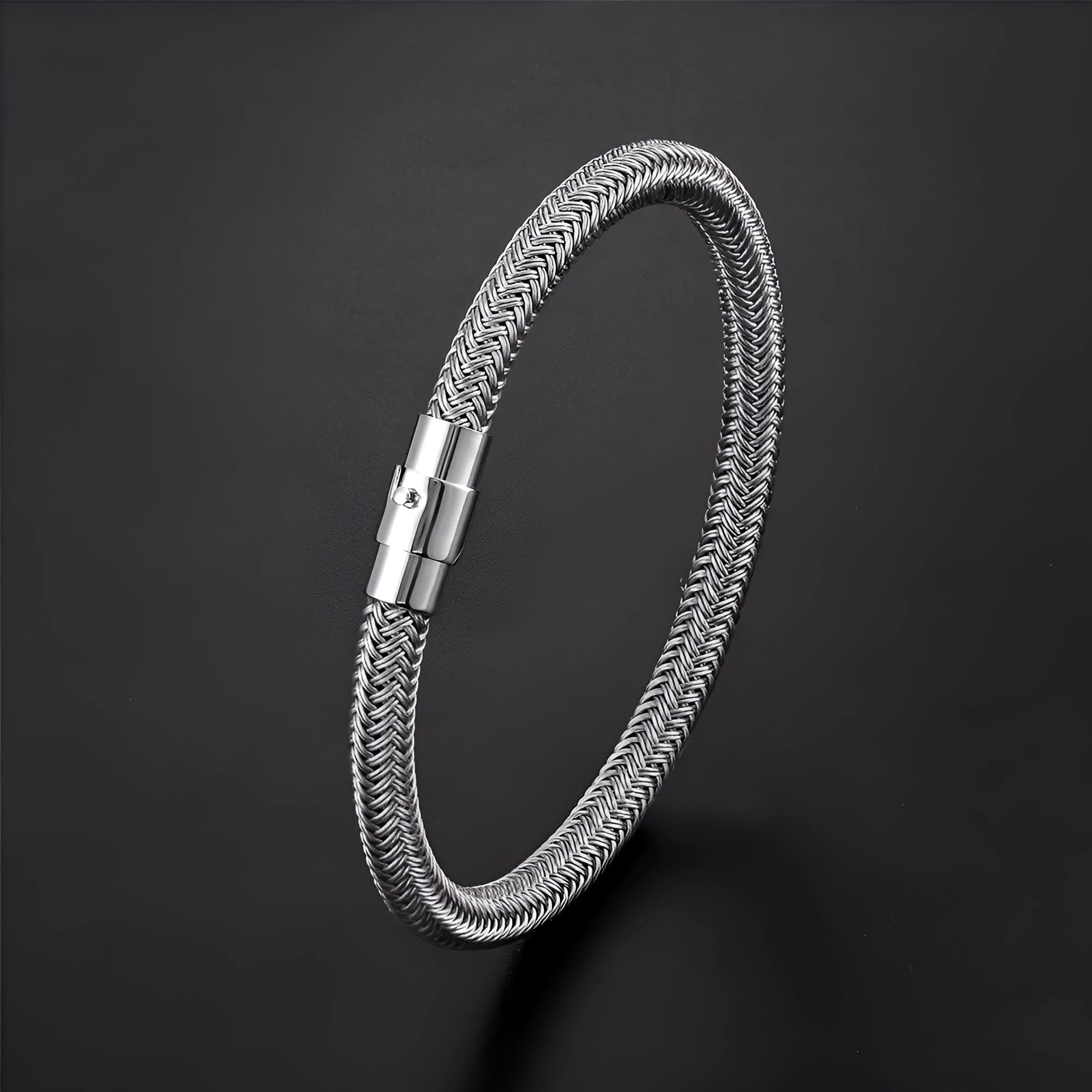 Titanium steel wire bracelet with magnetic clasp shown in a geometric unisex design.