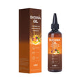 Batana styling cream moisturising treatment oil in 40x40x159mm container for hair strengthening