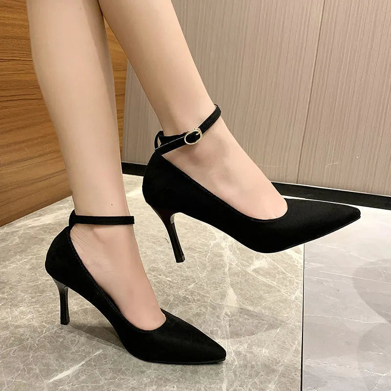 Women's black stiletto heels with skull pattern and buckle detail, 8cm heel height, rubber sole.