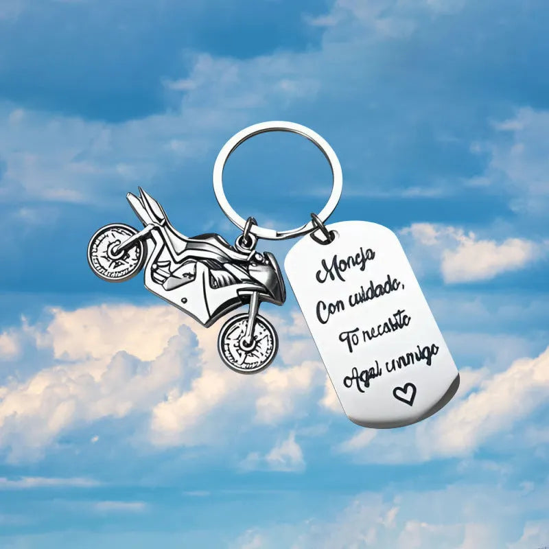 Stainless steel motorcycle keychain with modern design and included flannel bag.