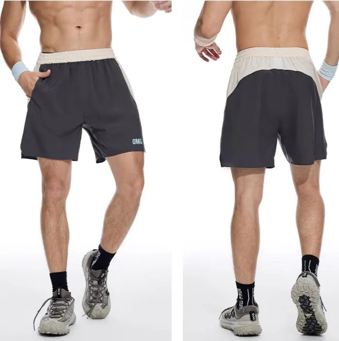 Men's loose hipp lifting workout shorts in dark rock ash colour with elastic waist