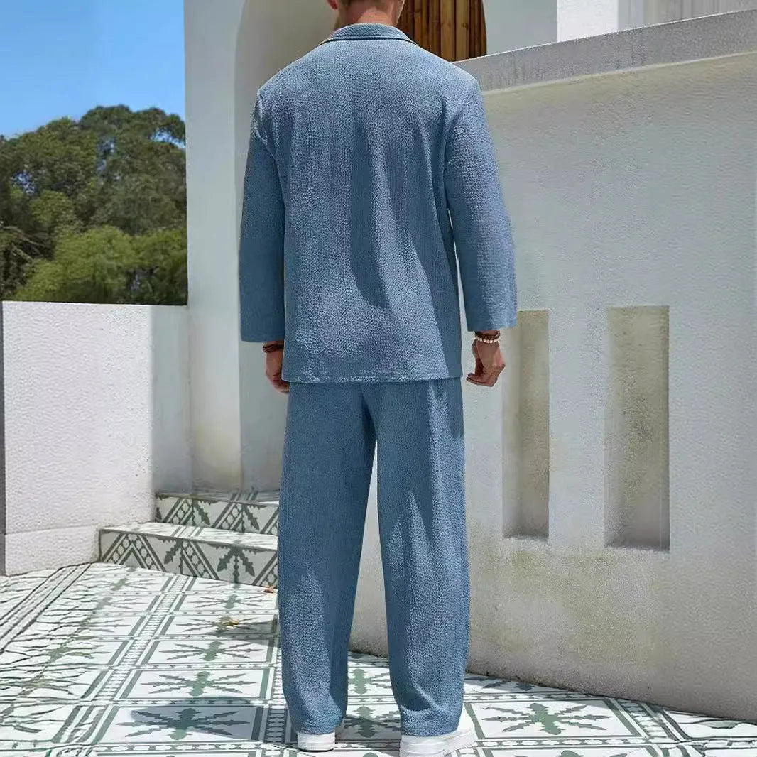 Men's casual shirt and trousers set in polyester fabric for autumn leisure wear.