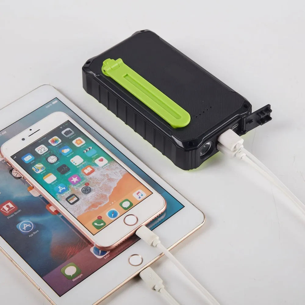 Green portable solar power bank with hand crank and 12000mAh capacity