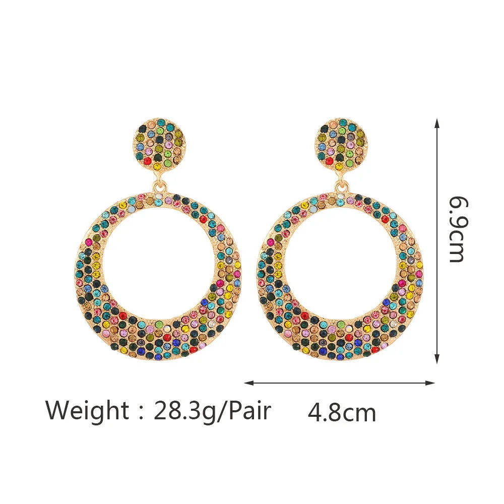 A pair of colourful cartoon style alloy earrings with large round pendant drops for women.
