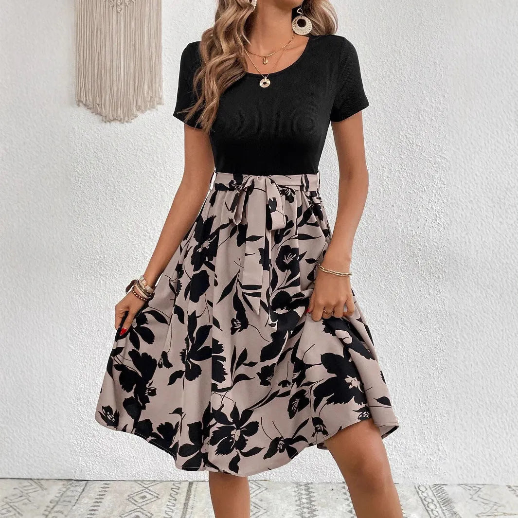 Women's khaki casual dress with plant print, A-line skirt, and shoulder strap detailing