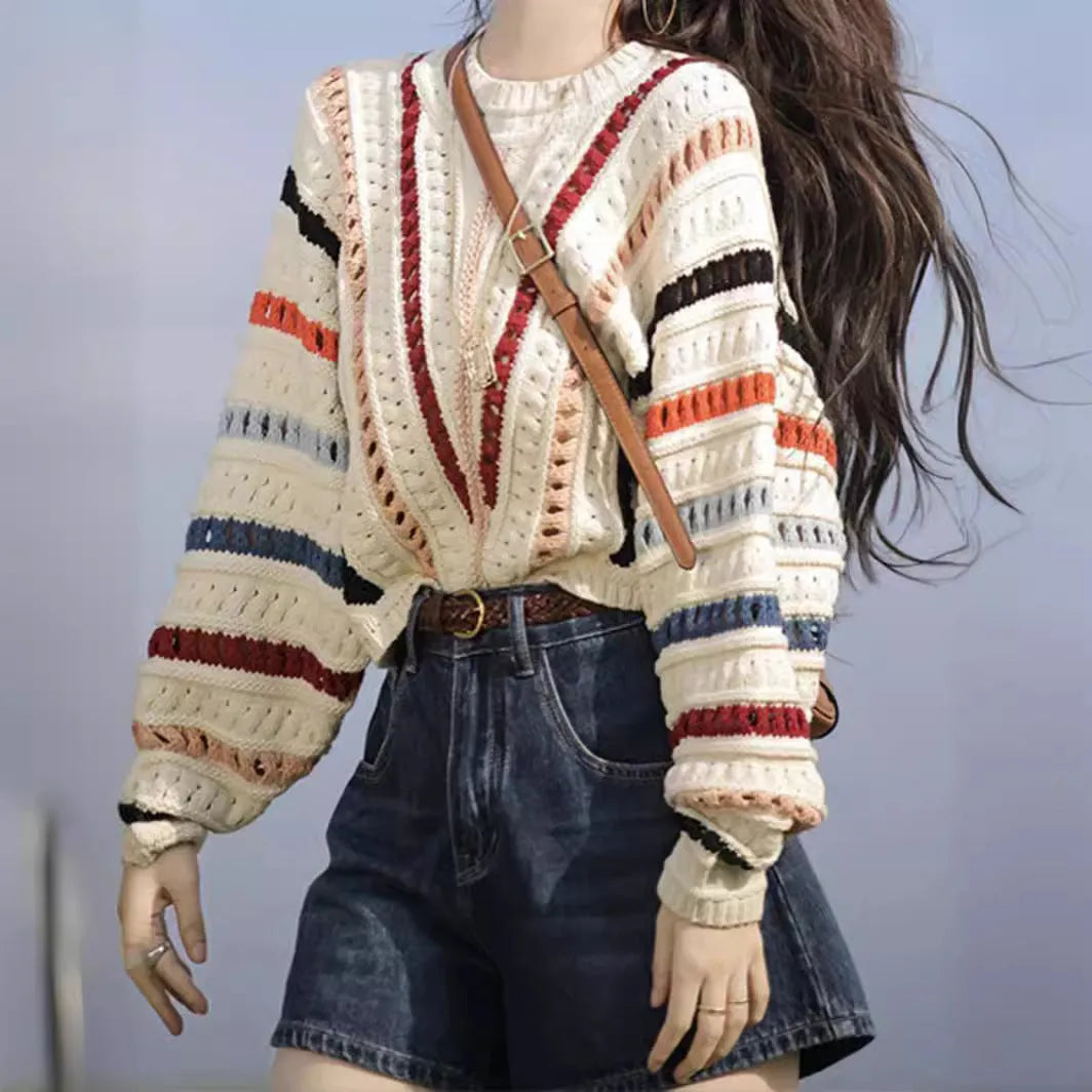 Colourful rainbow striped pullover sweater with batwing sleeves and hollow knit texture