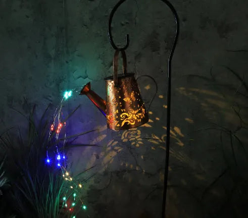 Solar garden lamp with butterfly pattern design and iron construction for outdoor lighting