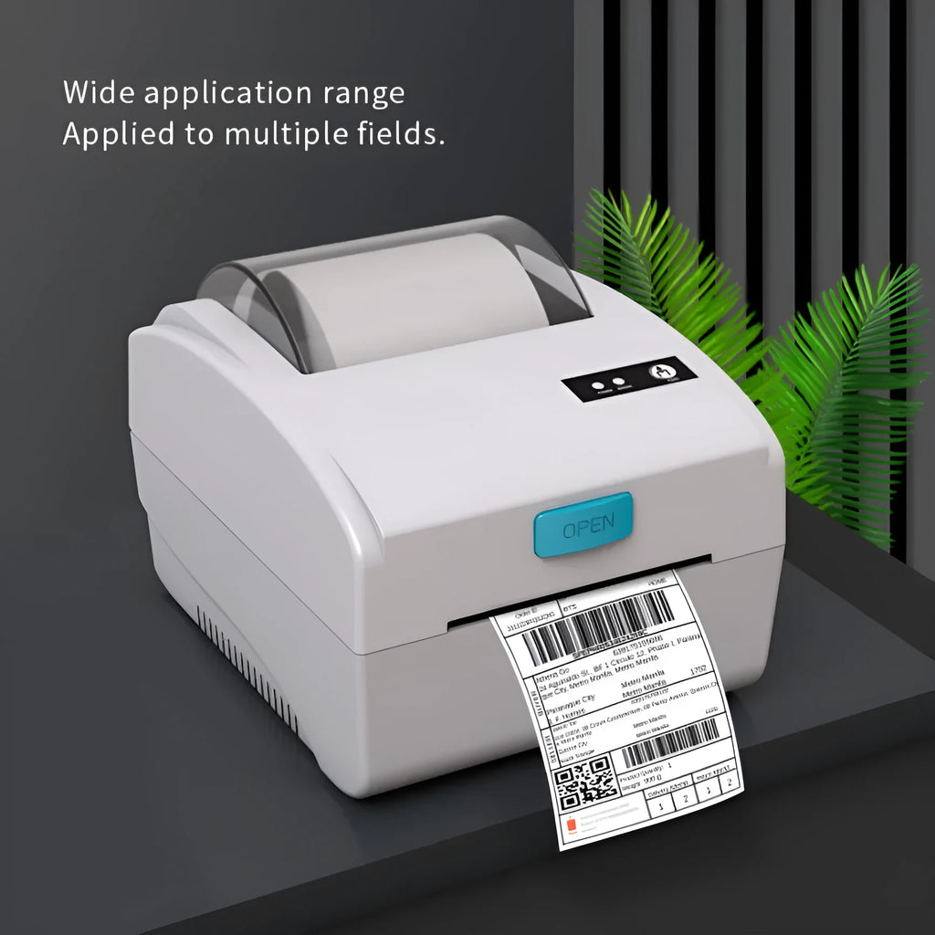 White compact thermal label printer with USB port and Bluetooth connectivity.