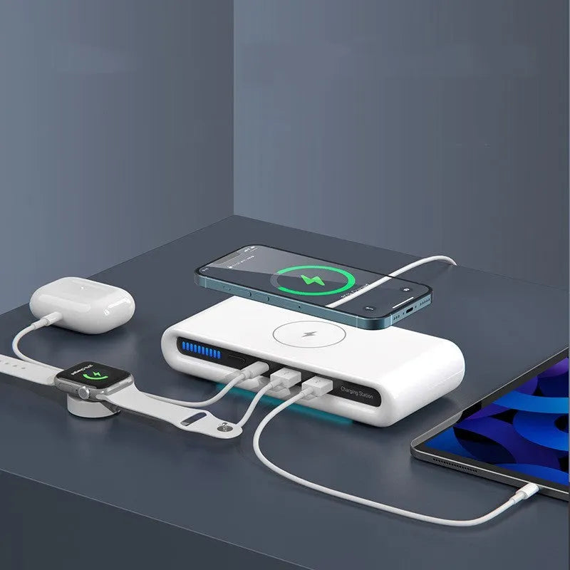 White desktop wireless charging pad with built-in 8-colour LED atmosphere lamp and included fast-charging cable.