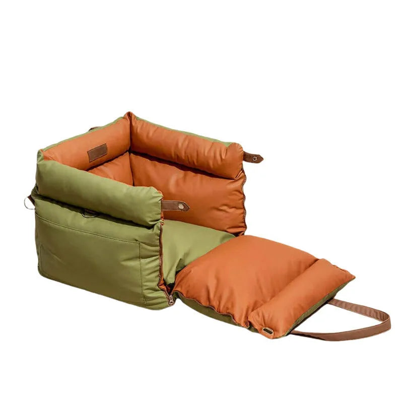 Green waterproof PU leather dog car nest with removable cover, shown in a car footwell.