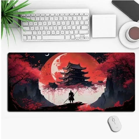 Large black gaming mouse pad with colourful anime character graphic on a desk with keyboard and mouse.