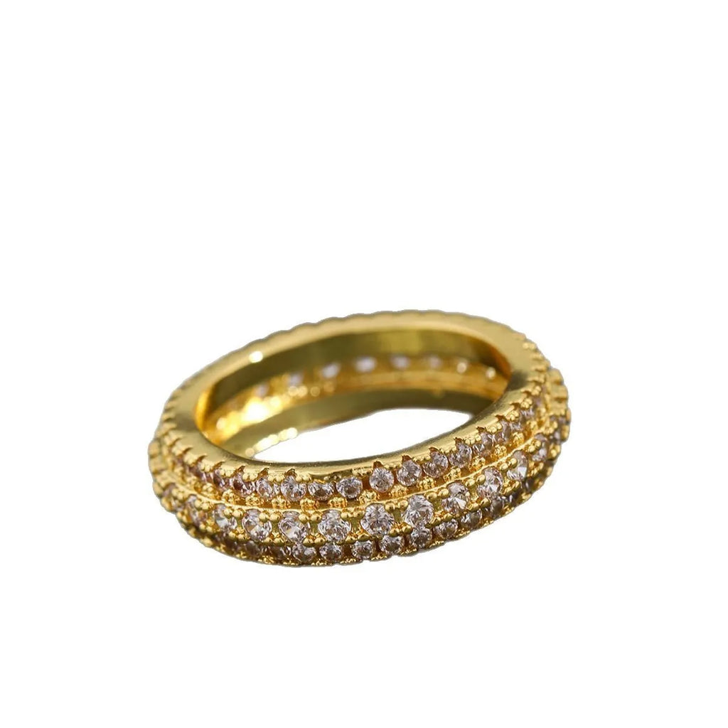 Geometric triangular unisex ring with a central zircon stone, shown in white gold, yellow gold, and white and black plating options.