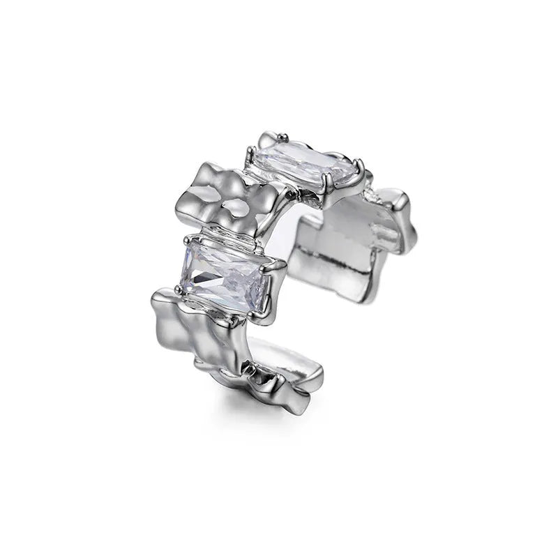 Silver geometric cross ring with zircon detailing and open gemstone setting