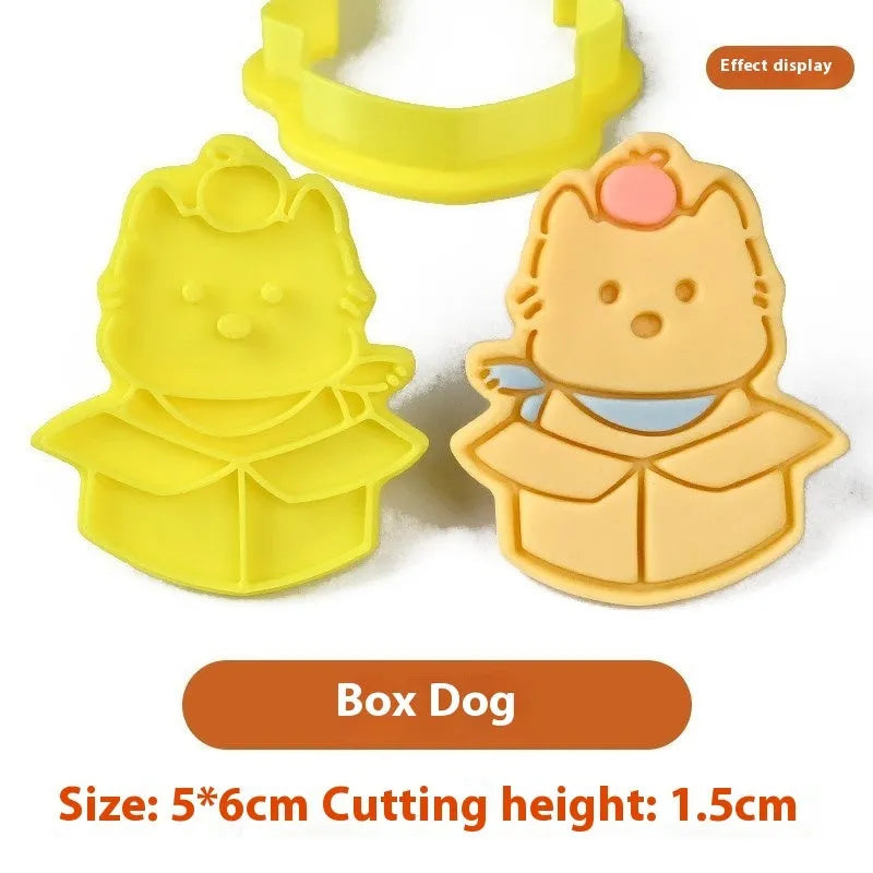 Three dimensional plastic biscuit mold with puppy cartoon designs including puppy head and birthday hat