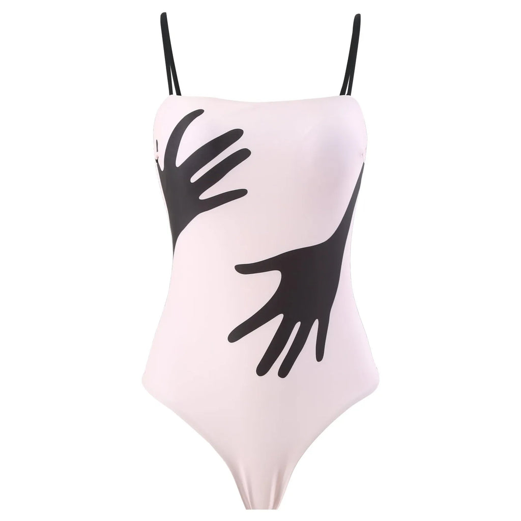 Women's patterned polyester bikini with attached sheer tulle skirt cover-up.