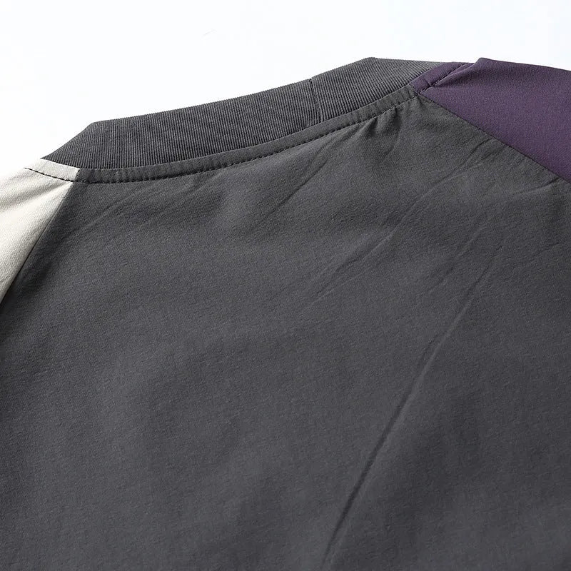 Dark grey men's t-shirt with contrasting raglan sleeves and a loose fit.