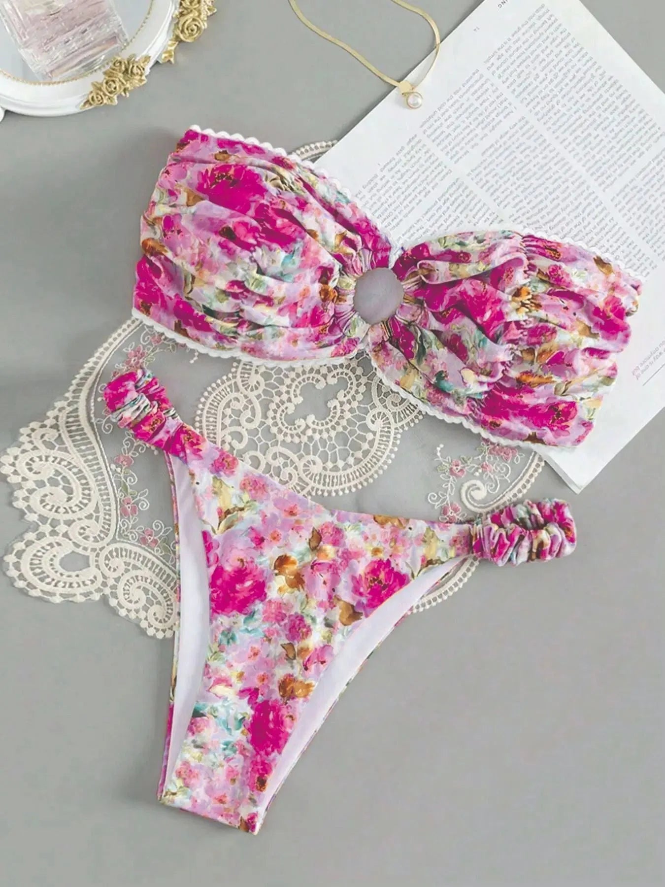 Women's floral print bikini set with lace trim tube top in blue colour