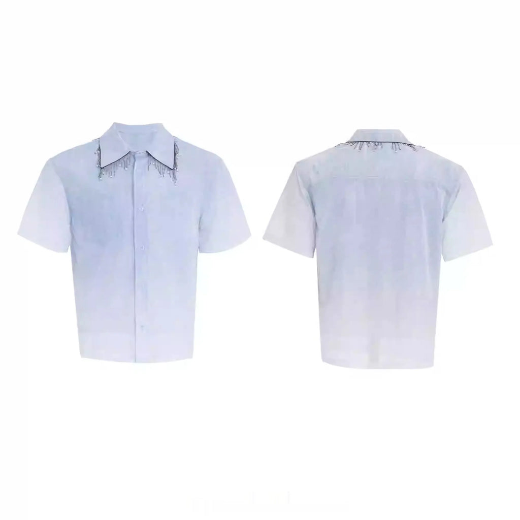 Man wearing a loose-fit gradient blue short-sleeved polyester casual shirt.