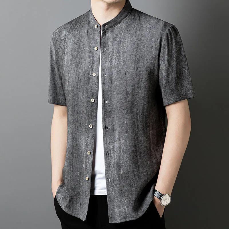 Men's loose fit linen shirt in solid colour with stand collar, shown in black grey.