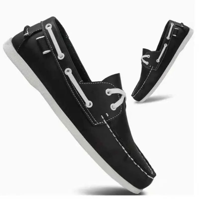 Men's British-style casual shoe with artificial PU upper, flat heel and round toe in solid colour.