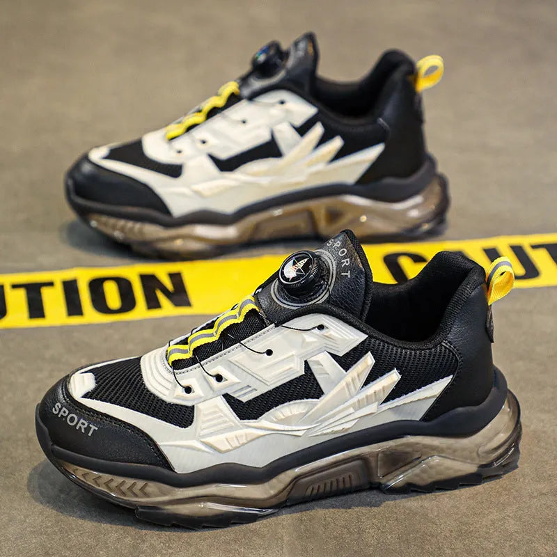 Men's black casual shoes with rotating button closure and platform sole design