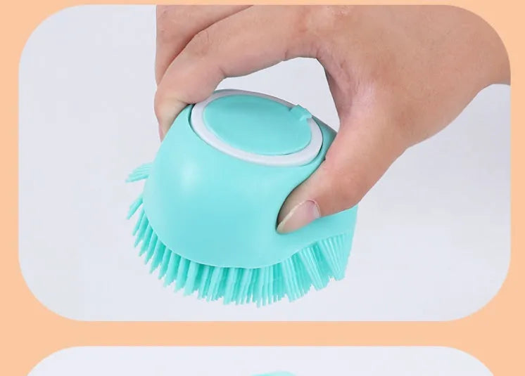 Blue silicone dog bath brush with finger grip handle for washing and massaging