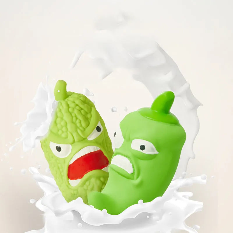 Vegetable-shaped dog chew toy in bitter melon and chili pepper designs with textured surfaces for dental cleaning