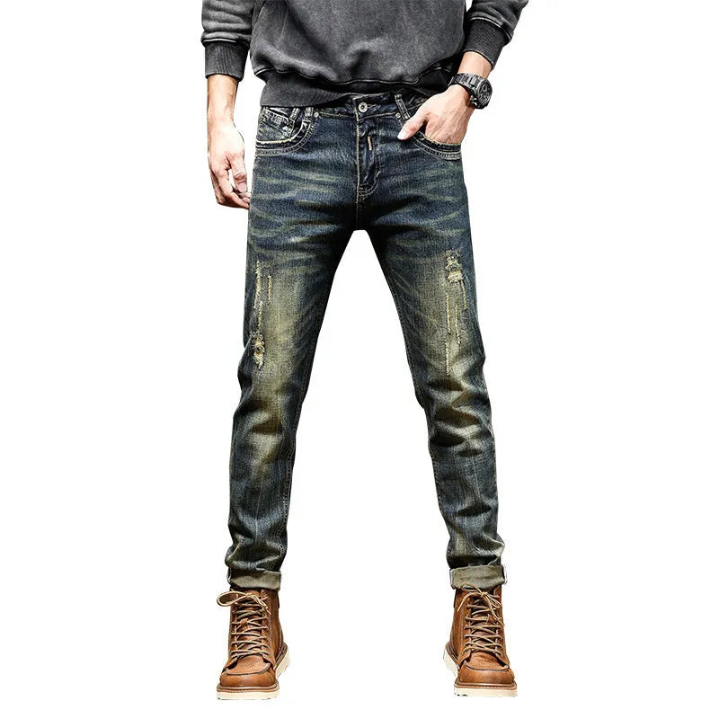Man wearing retro blue skinny fit stretch denim jeans with a zip fly.