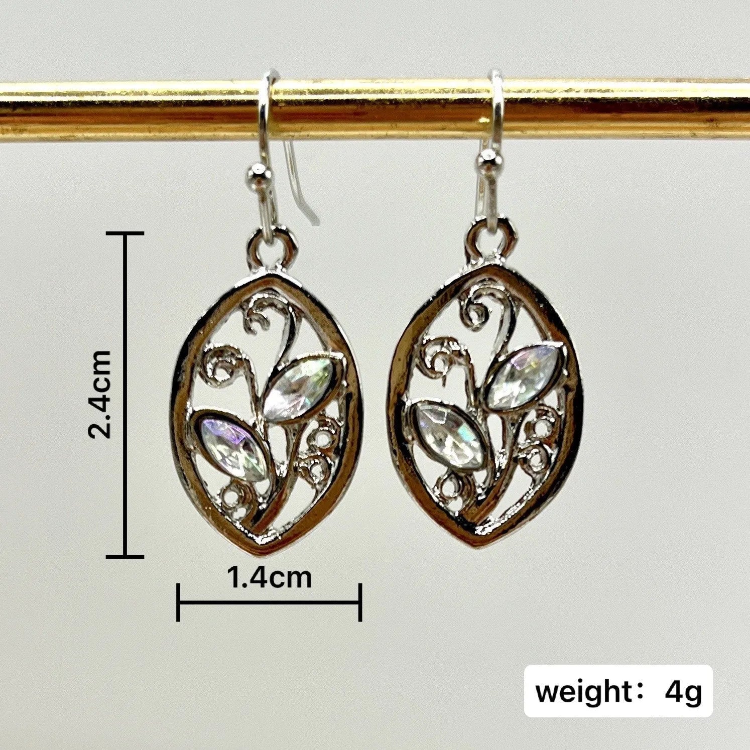 Silver-coloured alloy leaf earrings with embedded colourful moonstone gemstones for women.