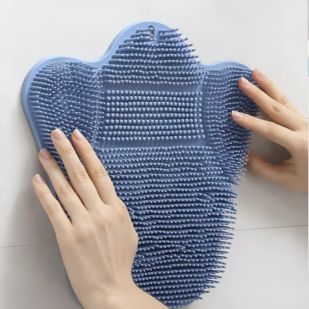 Blue silicone bath massage mat with textured surface for exfoliation