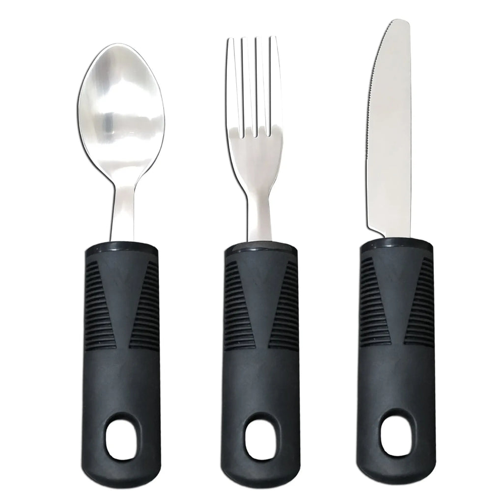 Stainless steel adaptive spoon and spork set with black rubber handle on a table.