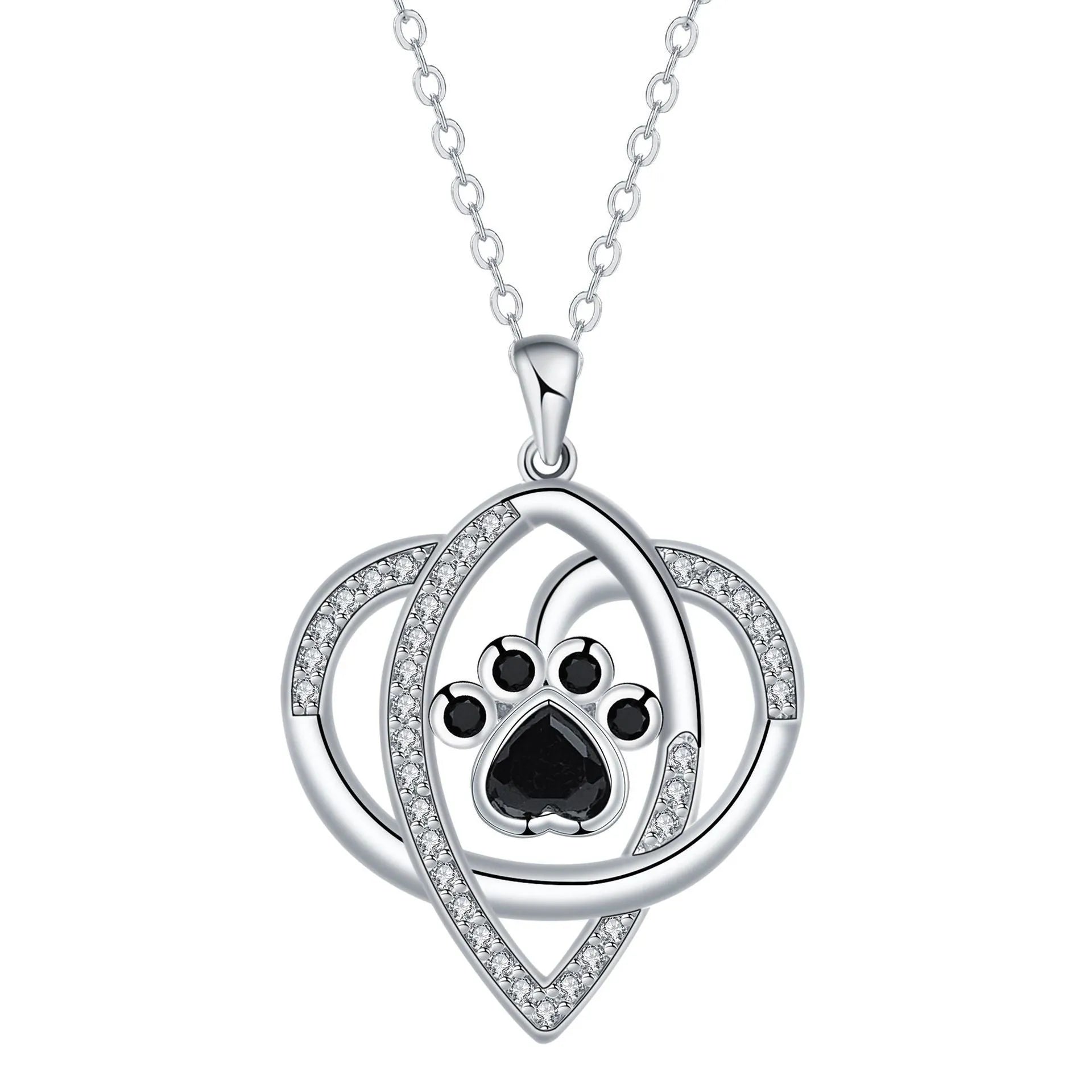 Close-up of a copper pendant necklace showing a charm with dog paw and cat footprint designs on a cross chain.