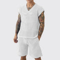 Men's blue V-neck sleeveless vest and matching shorts sports suit on hanger