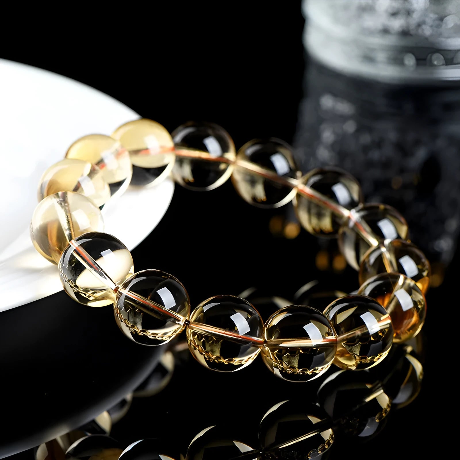 Natural citrine scattered beads bracelet showing polished gemstone beads on a cord.