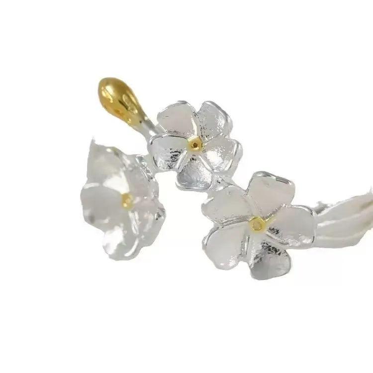 Three-dimensional jasmine flower adjustable ring in zinc alloy with open mouth design