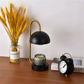 Solid wood aromatherapy wax melting lamp with dimmable knob on a bedside table