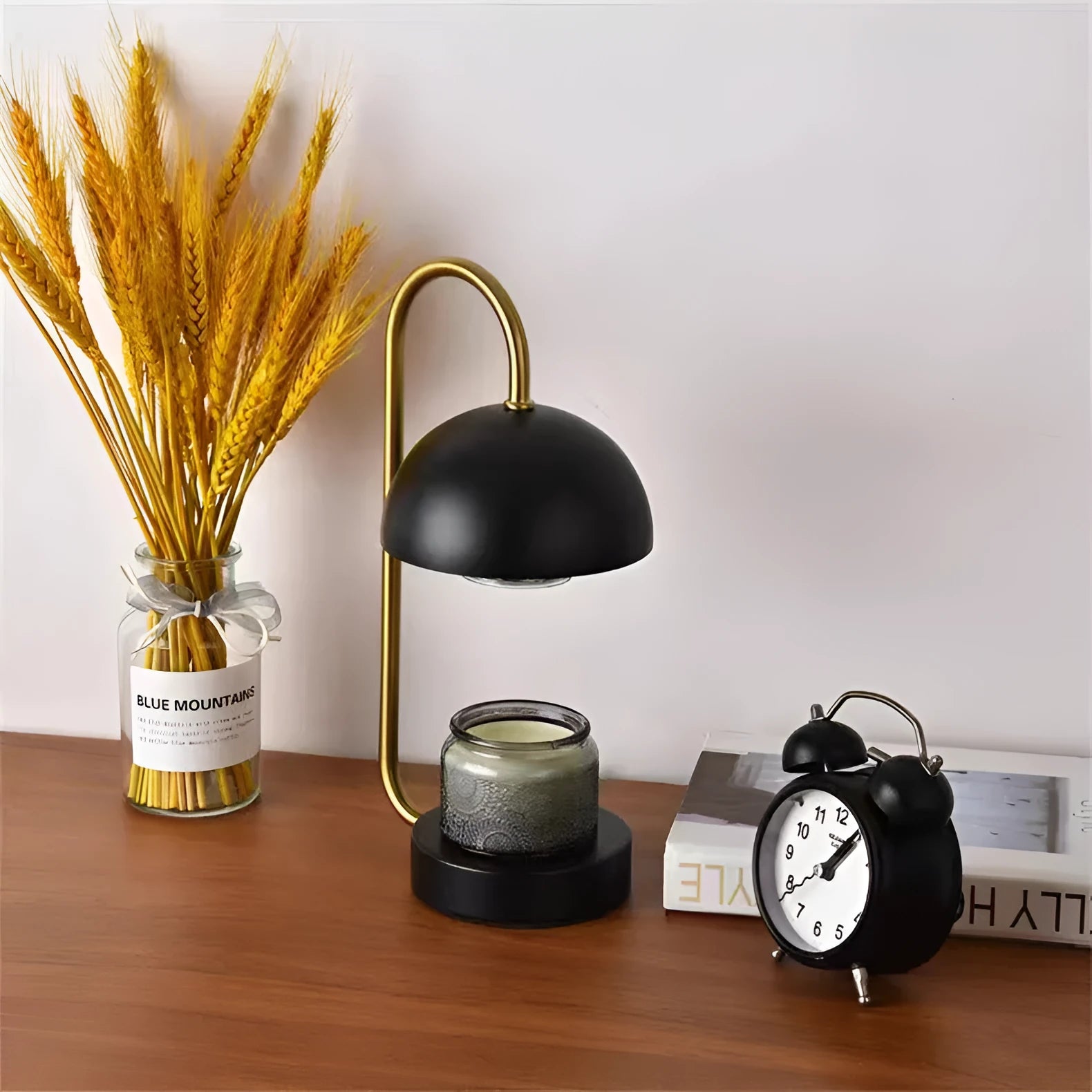 Solid wood aromatherapy wax melting lamp with dimmable knob on a bedside table