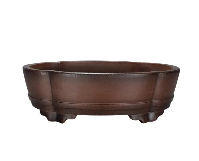 Classical purple clay flower pot for plants, shown on a tabletop.
