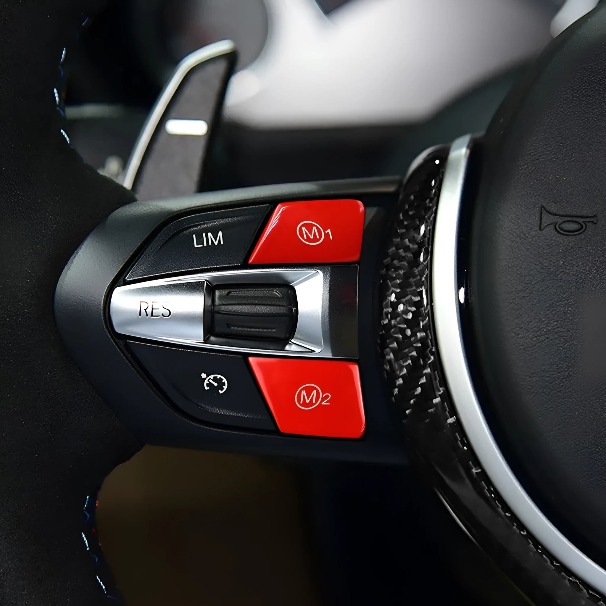 Red and blue BMW steering wheel M1 M2 mode replacement button set with installation keys.