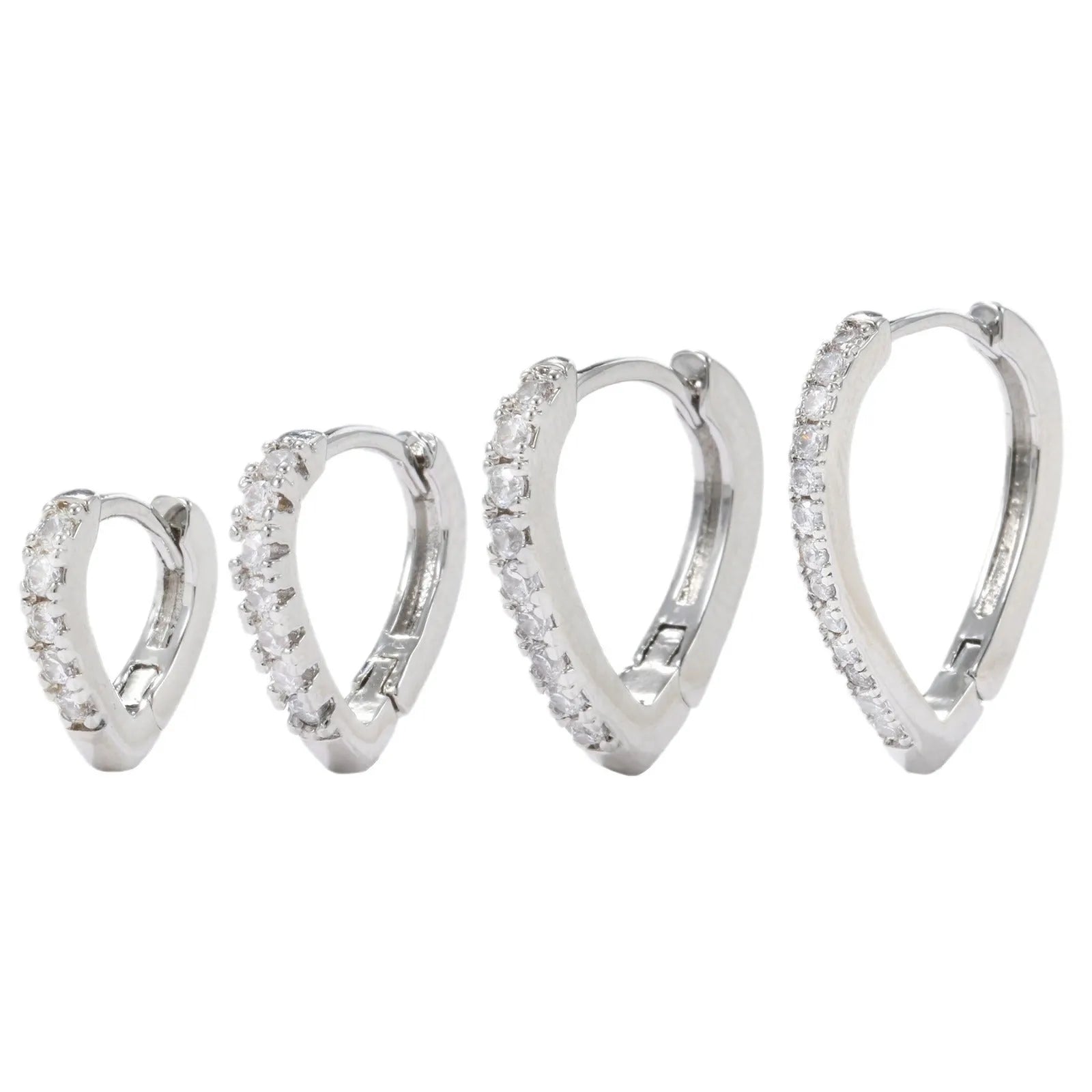A geometric heart-shaped copper ear clip with a gold or white electroplated finish.