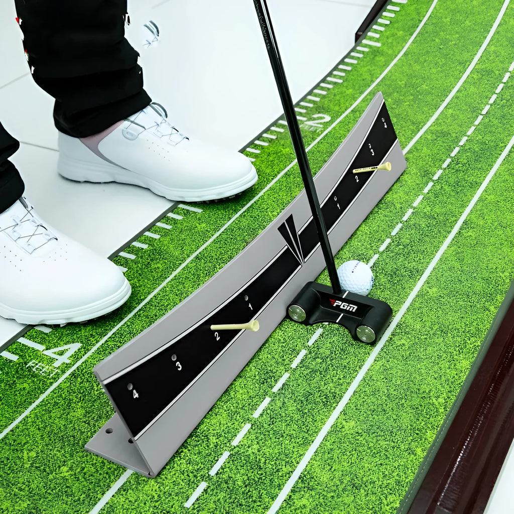 Golf putter trajectory balance simulator with adjustable push rod on a practice green.