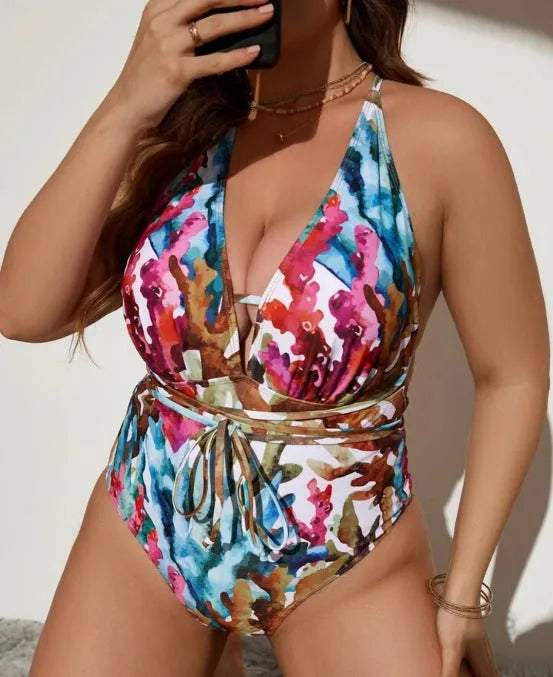 Solid blue women's halter neck one-piece swimsuit on a mannequin, showing European and American style bikini cut