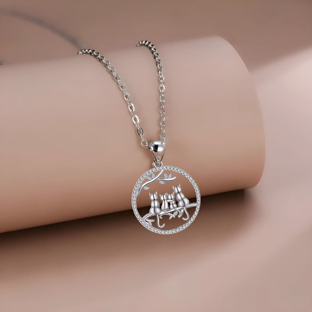 Women's copper necklace with four kitten pendant design and cross chain