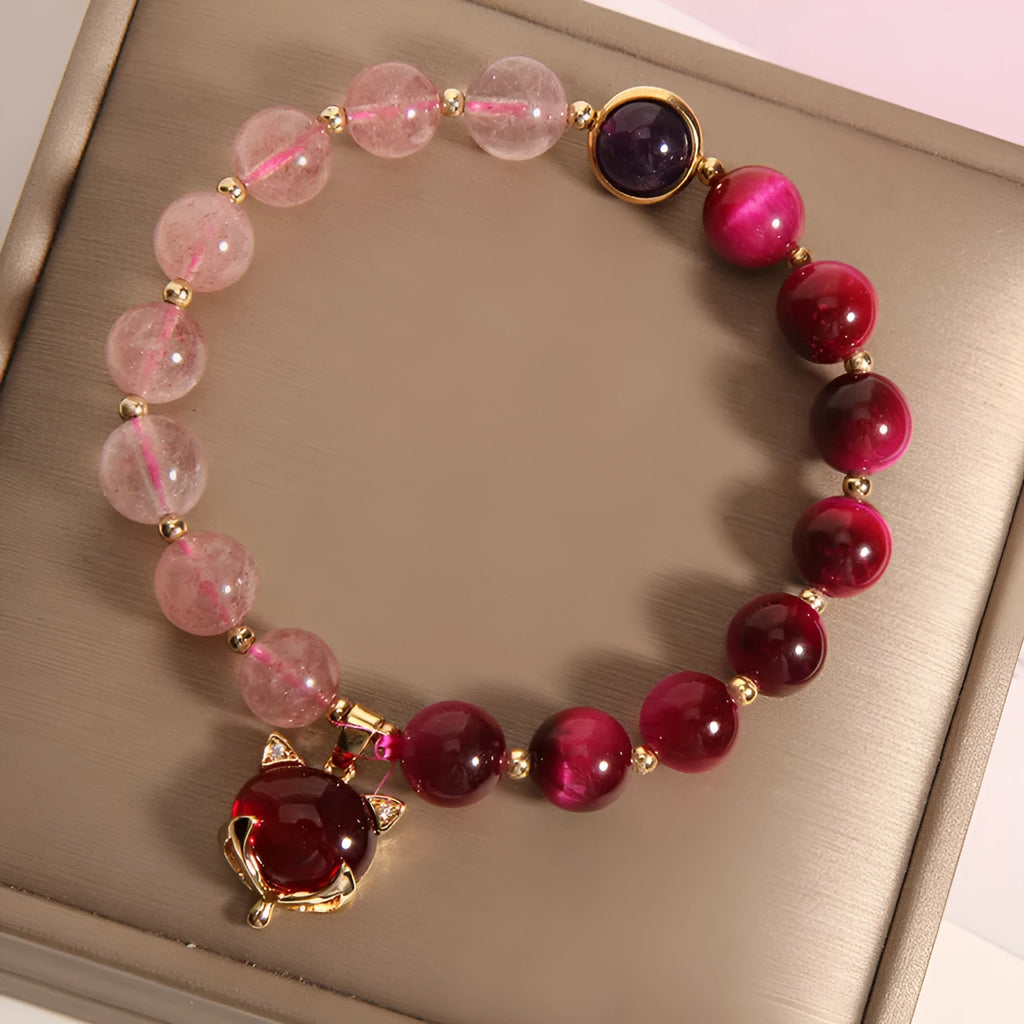 Strawberry crystal bead bracelet on elastic rope measuring 18cm with simple design
