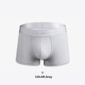 Men's solid colour cotton boxer shorts in black, shown flat