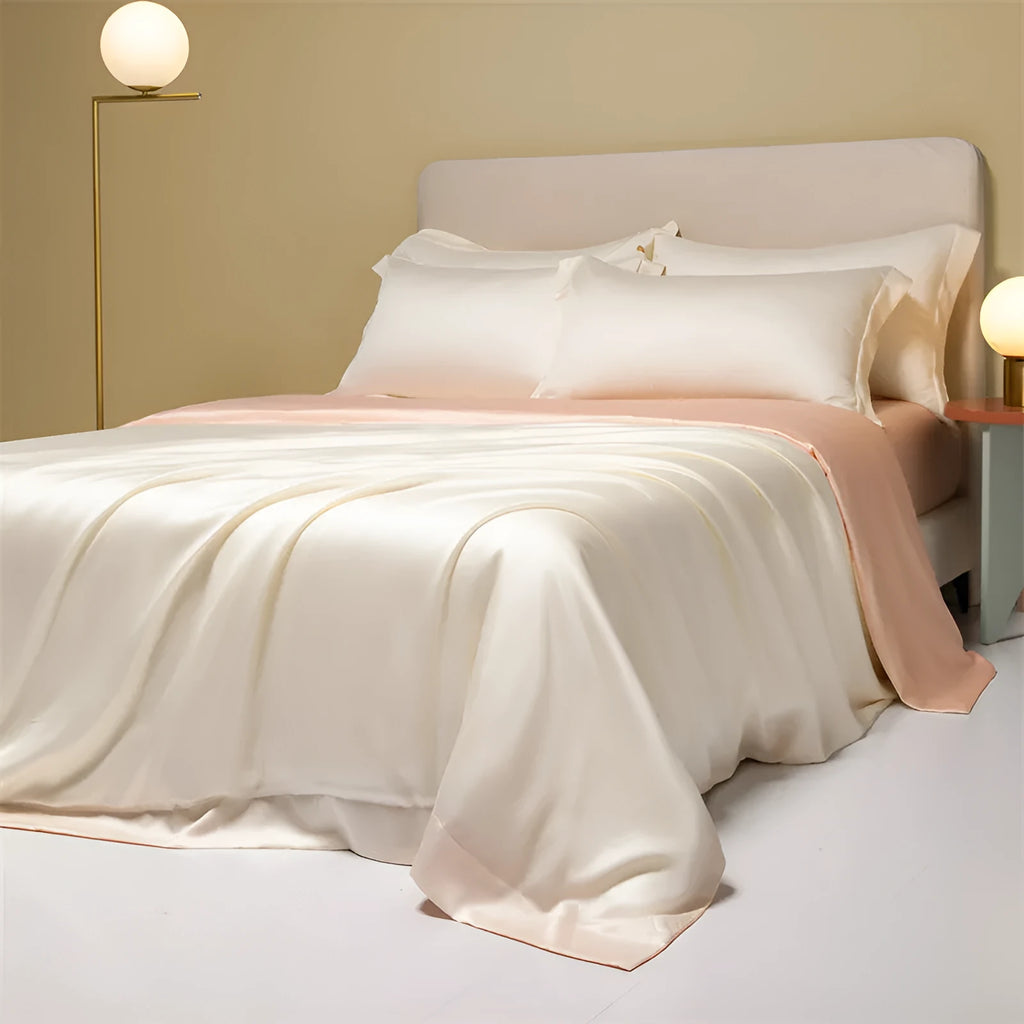 Solid colour Tencel Lyocell bed linen set with quilt cover and pillowcases on a bed.