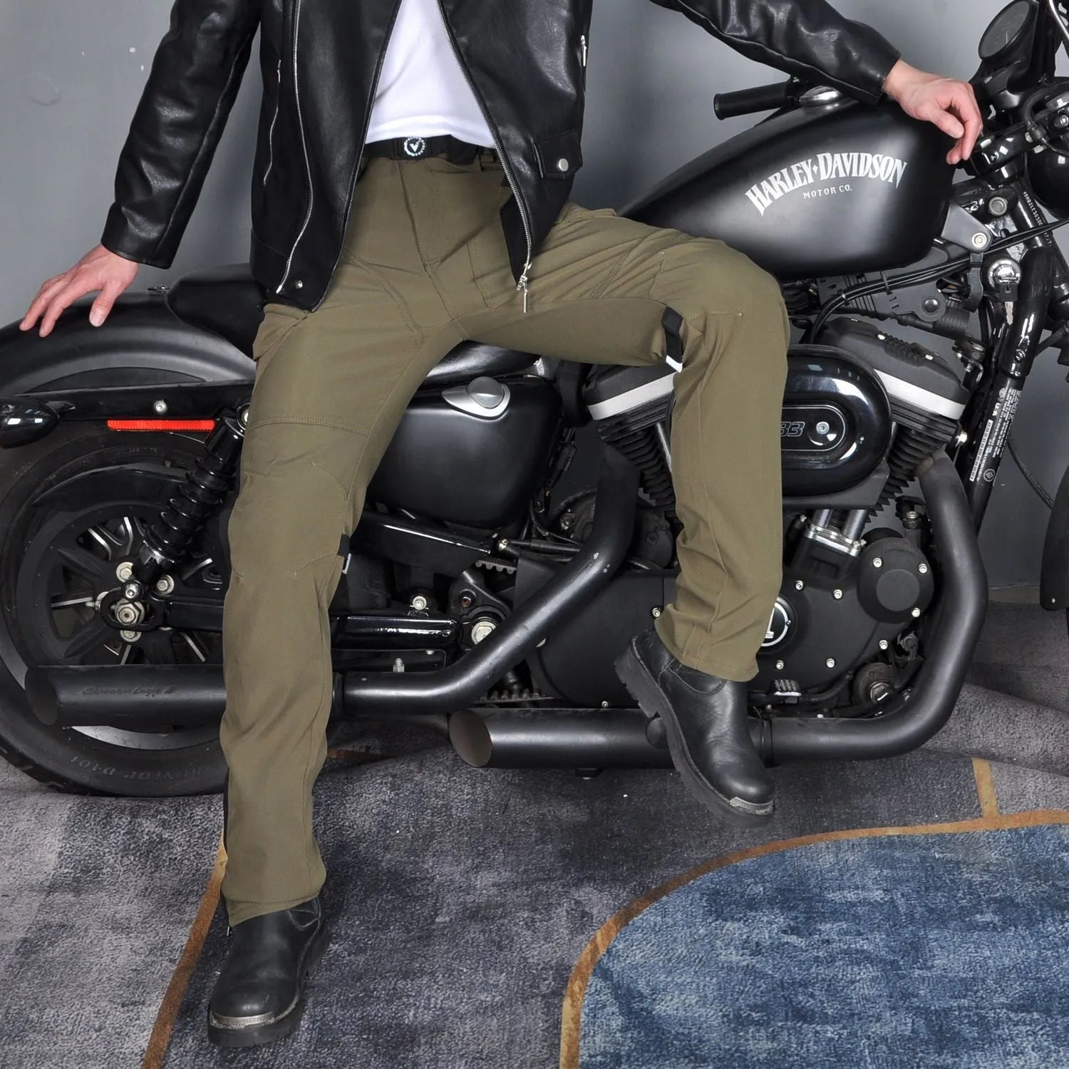 Men's waterproof motorcycle cycling trousers with protective gear in black or green colour options